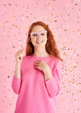 portrait-cheerful-woman-shower-confetti(1)